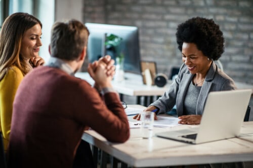 real estate agent working with clients